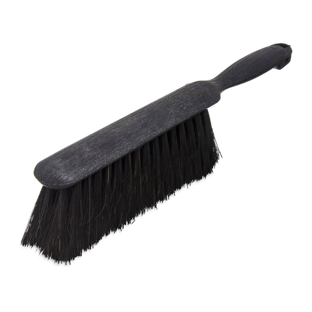 Black counter brush with dense bristles and curved 8-inch bench handle