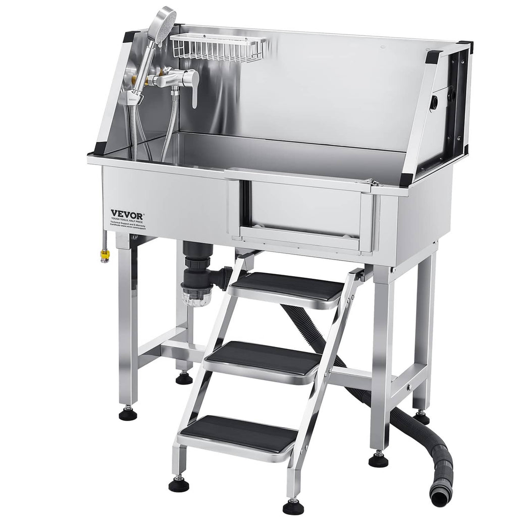 Pet grooming bath station with stainless tub, stairs, and black flexible hose connection