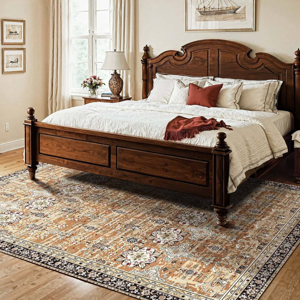 Vintage floral area rug with decorative border in tan, cream, and dark trim