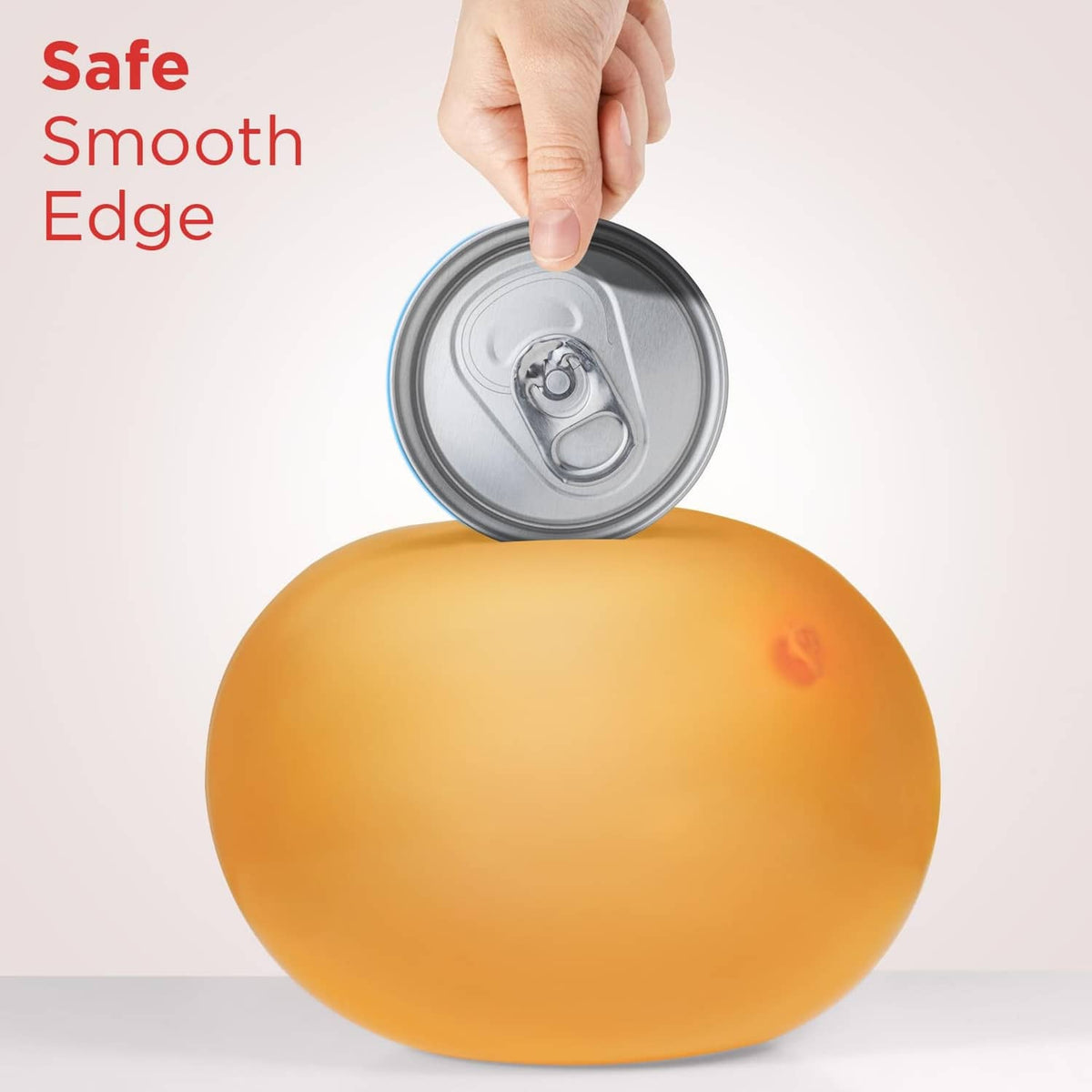 Electric can opener with smooth edge design; hand lifts a can lid