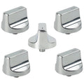 Set of five silver metal stove control knobs with D-shaped ring detail