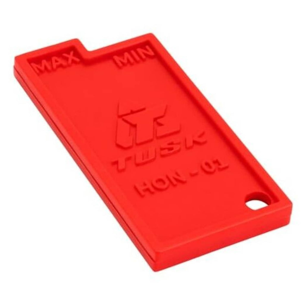 Red chain slack measuring tool with MAX and MIN markings, small single-hole design