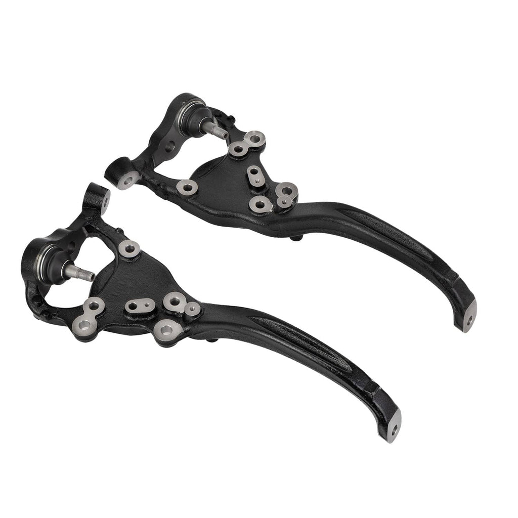 Pair of front steering knuckles with black control arms and ball joint housings