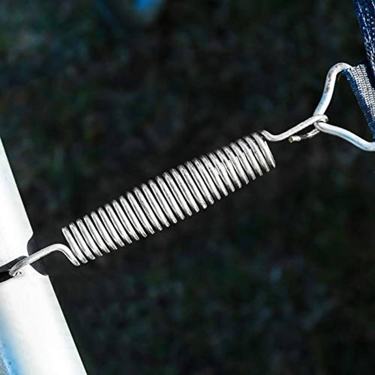 Galvanized steel trampoline spring coil with attached end hook on trampoline frame