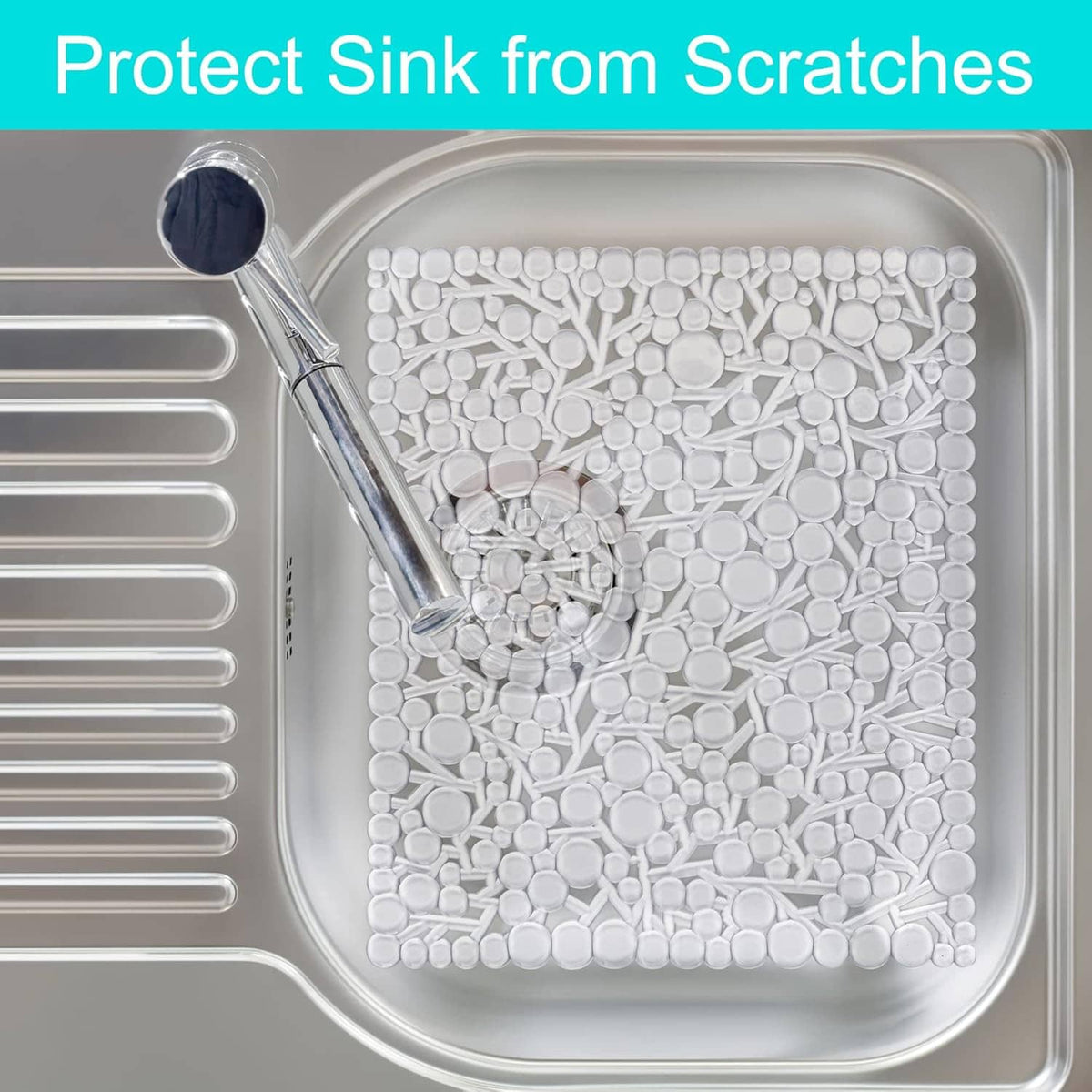 White bubble-texture sink mat fitted in stainless steel sink basin