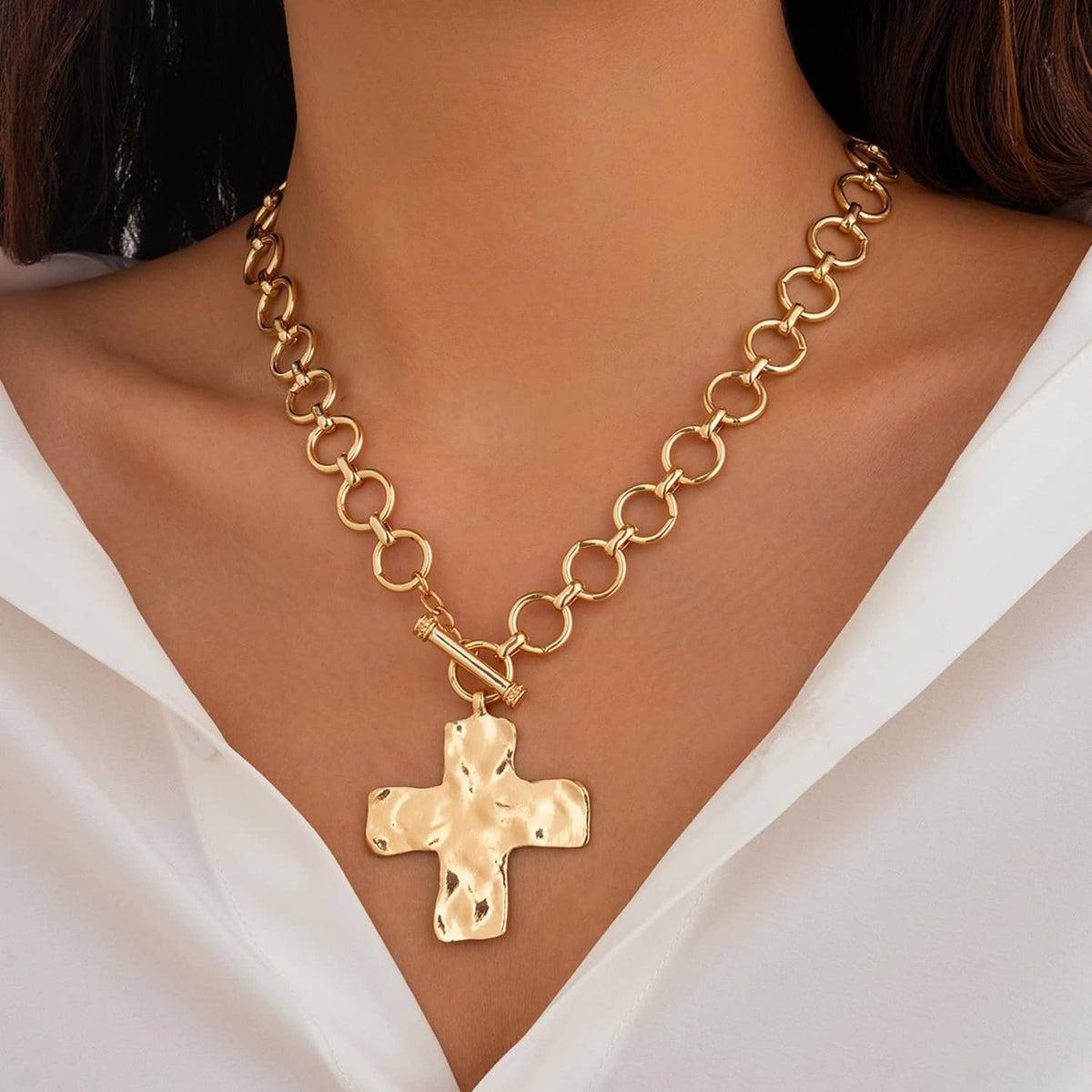 Gold-tone oval-link chain necklace with textured cross pendant