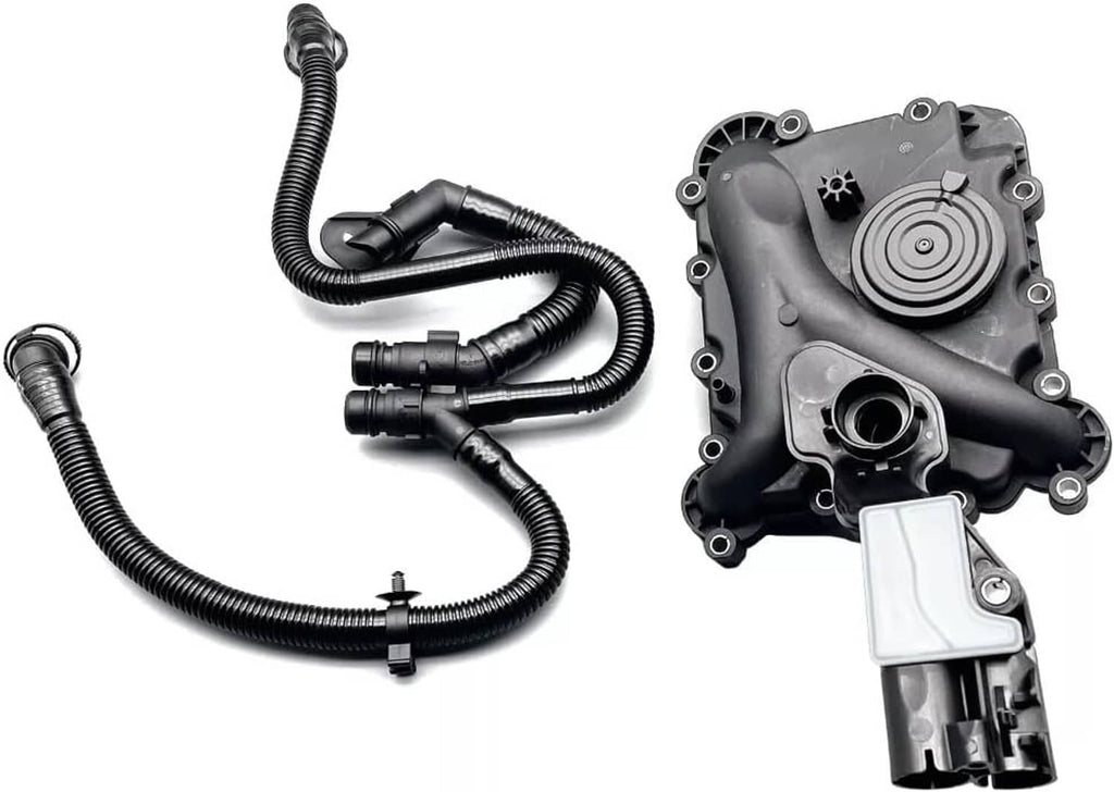 Oil separator PCV valve assembly with black plastic housing and attached vent hoses