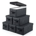 Stacked black foldable CD storage boxes, set of 6, with hinged lids and front handle cutouts