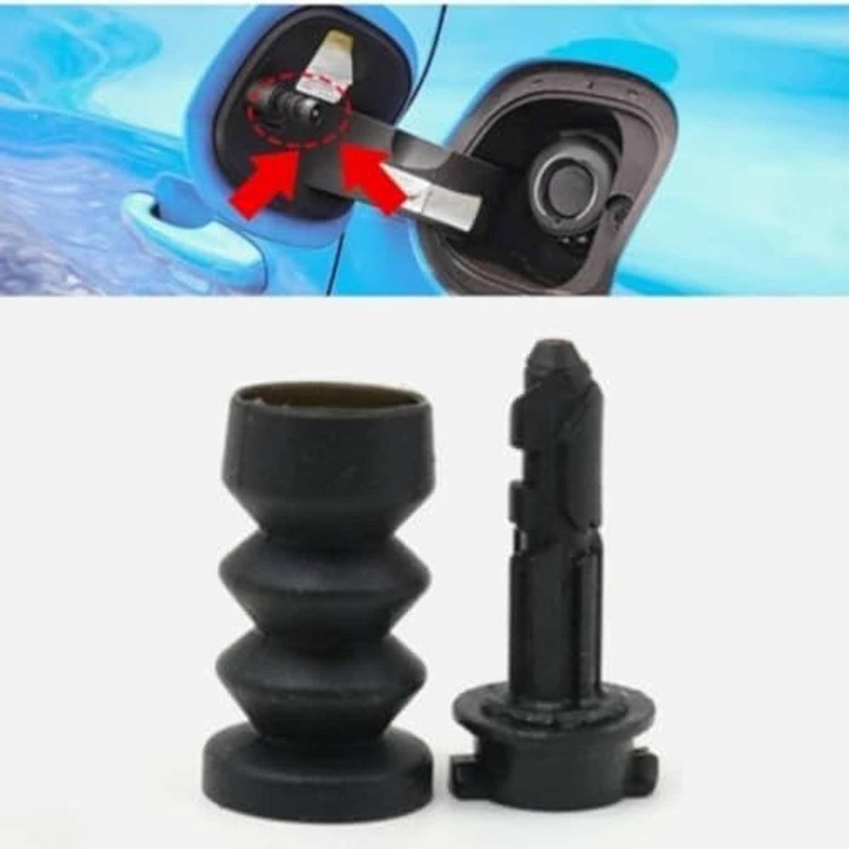 Fuel tank filler door release latch near fuel door opening, black rubber boot and pin.