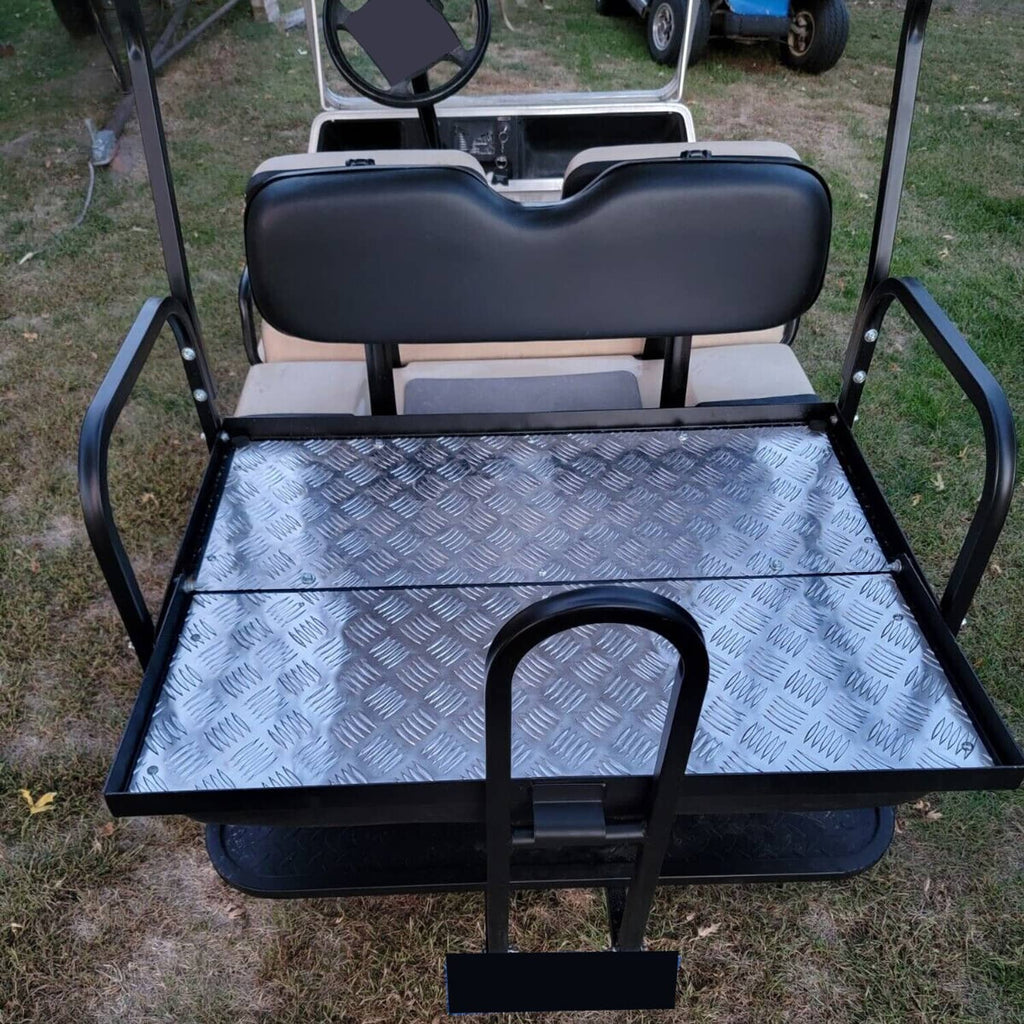 Rear flip seat kit with two black seats and diamond-plate cargo bed, front handle bar