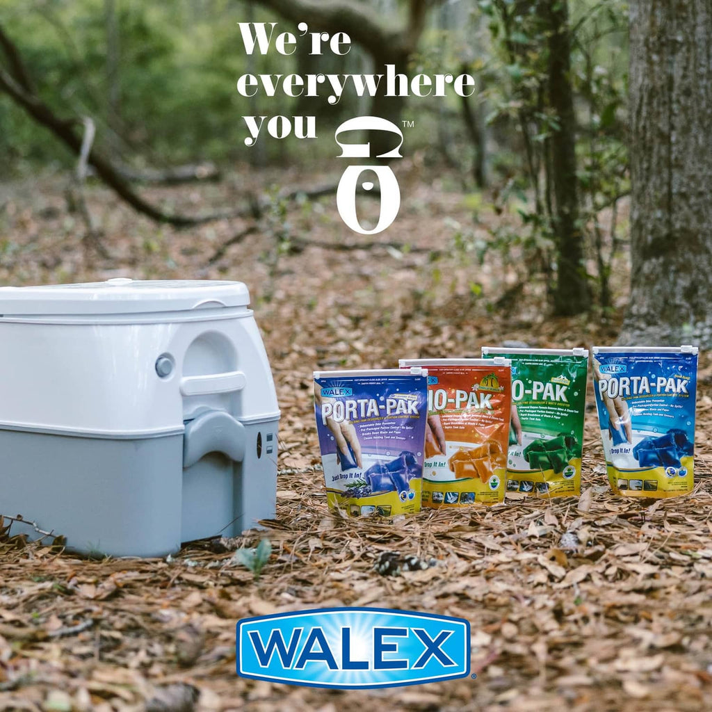 Walex Porta-Pak holding tank deodorizer pouches on ground beside RV toilet