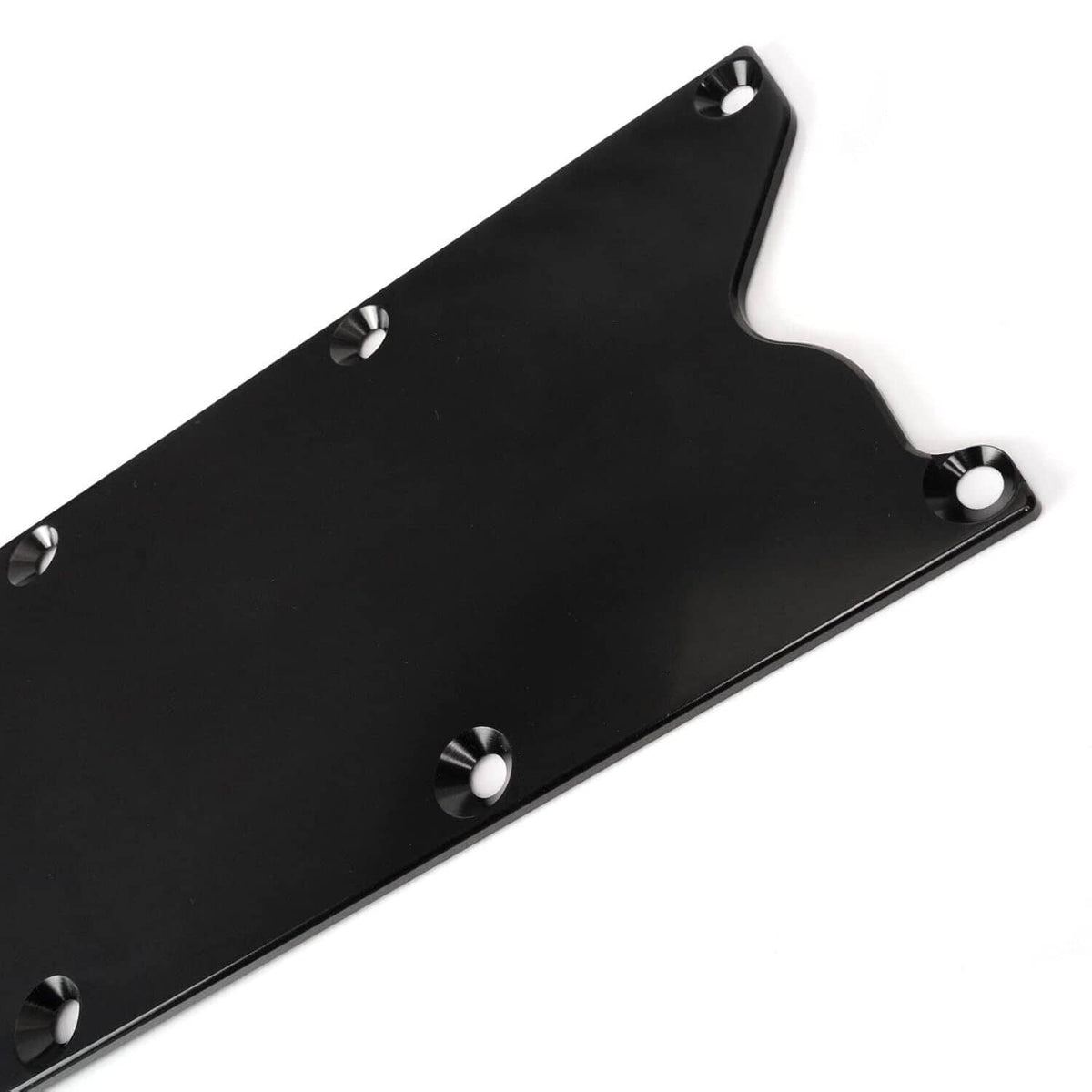 Billet aluminum valley pan cover plate with black finish and side mounting bracket holes