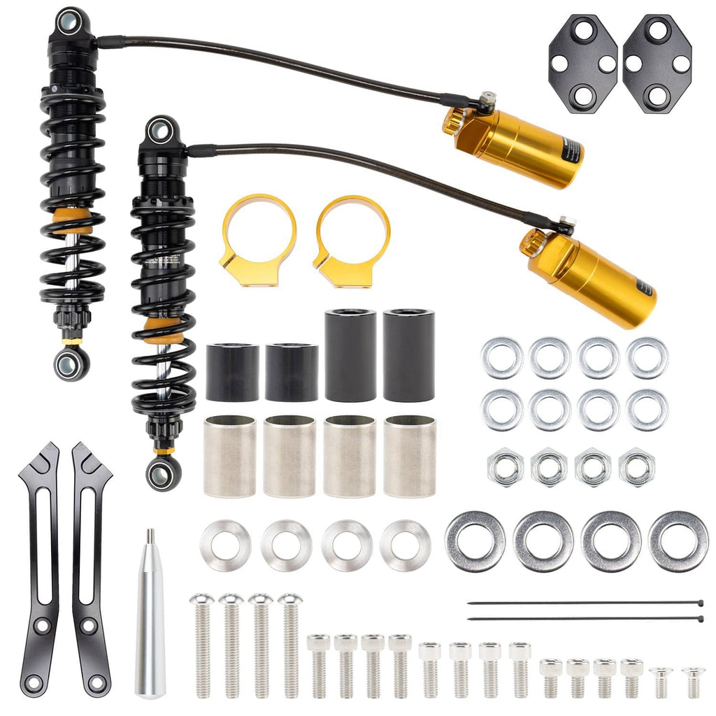 Rear shocks kit laid out with two shocks, gold reservoirs, brackets, and fasteners
