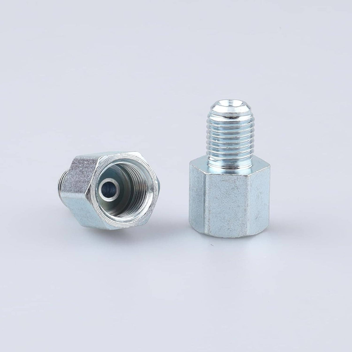 Brake line thread adapter set with silver hex fittings and visible internal female opening