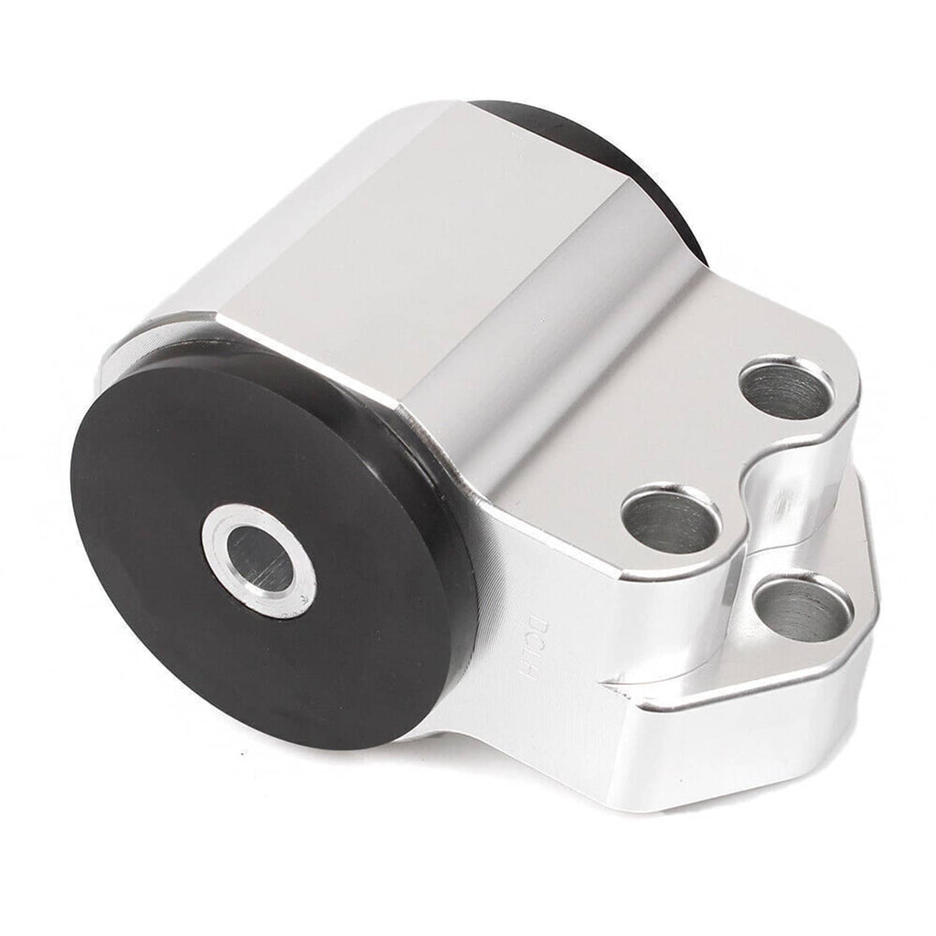 Engine motor mount with black bushing and silver housing, angled close-up