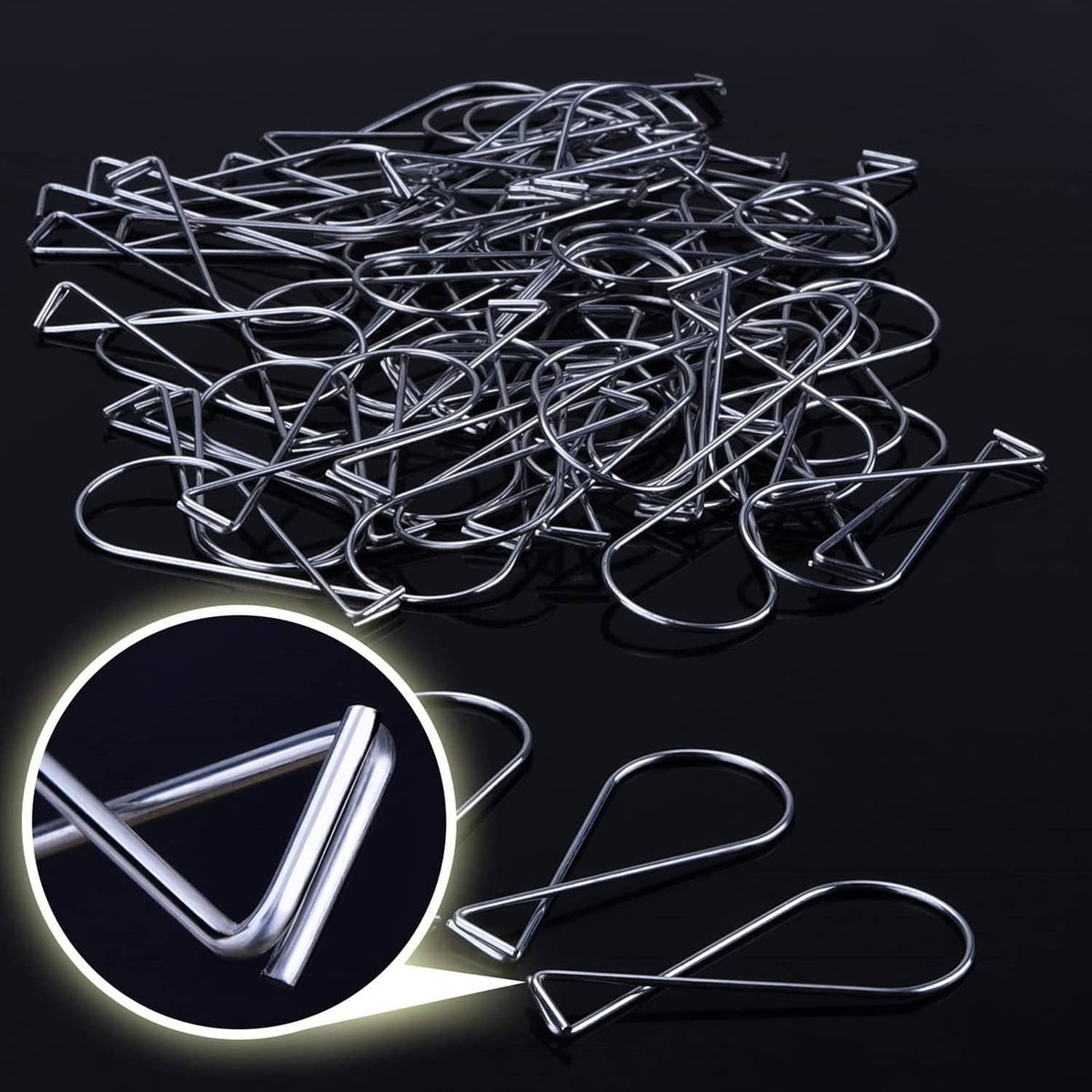 Pile of silver ceiling hook clips, metal wire loop ends for drop ceiling tiles