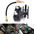 Engine valve spring compressor tool with brass air hose and black mounting base