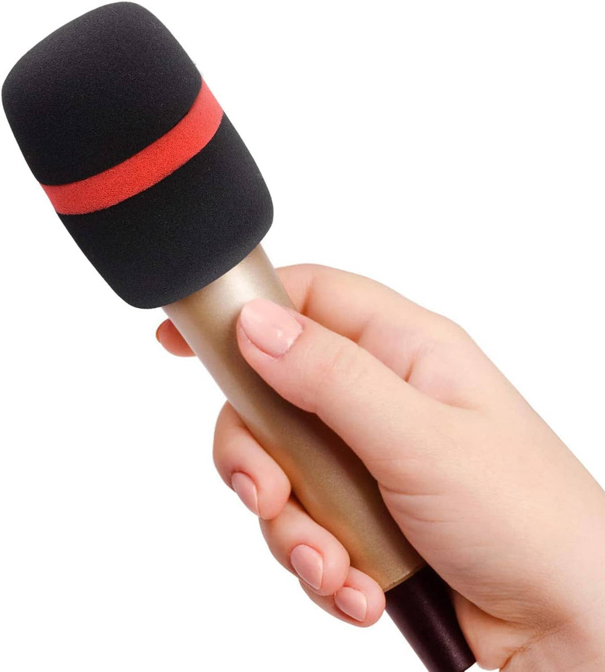 Hand holding handheld microphone with black foam windscreen and red band