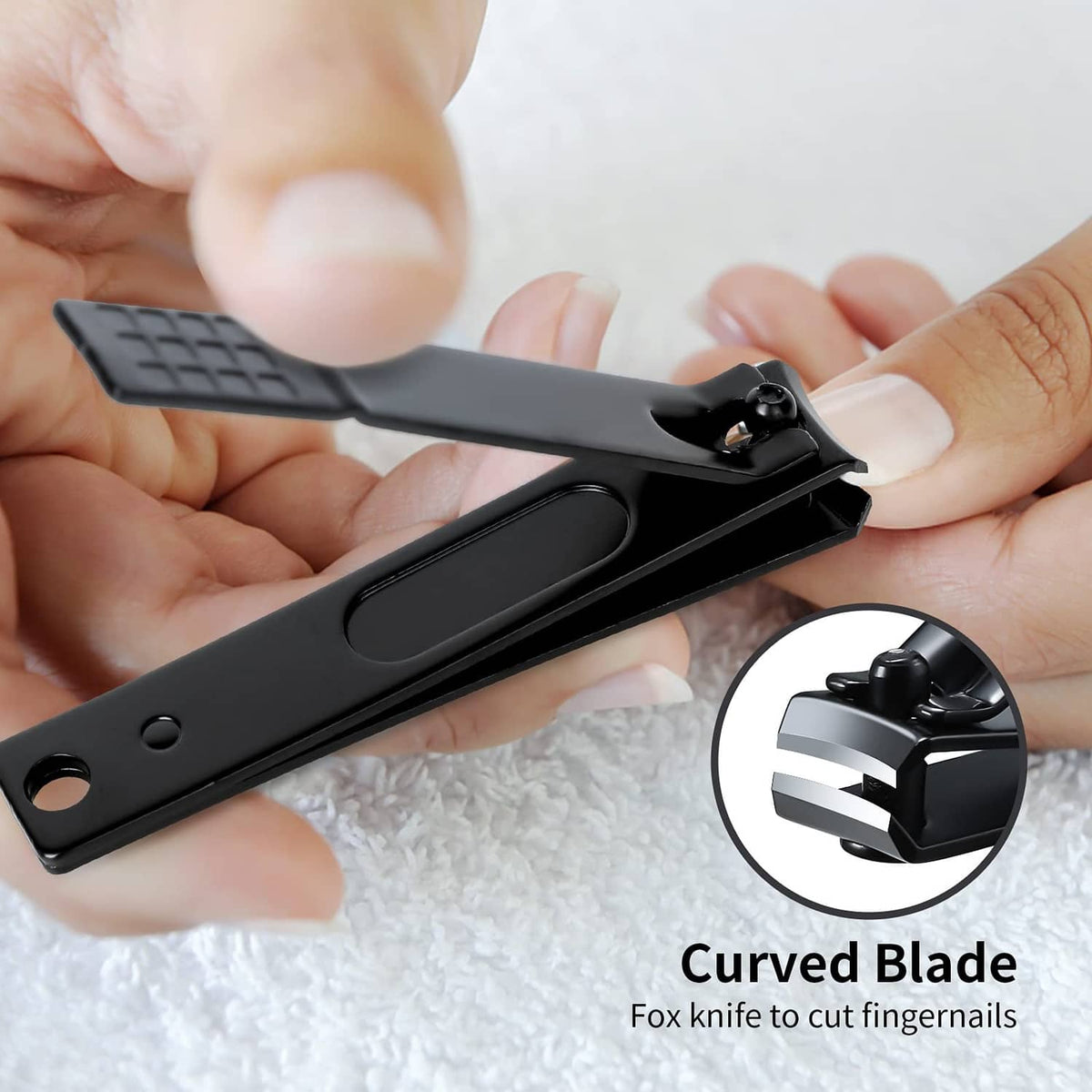 Black nail clipper with curved blade and integrated nail file, anti-slip grip