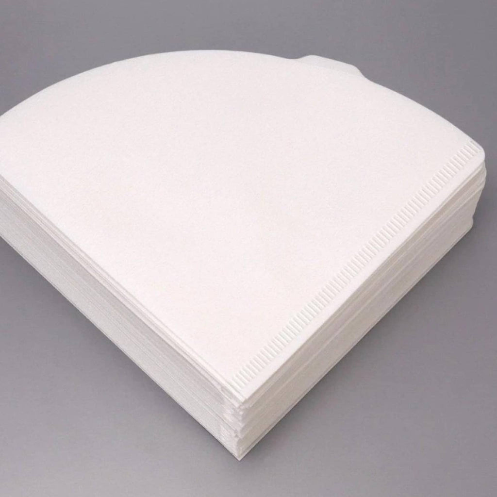 Stack of white V60 paper coffee filters, Size 02, neatly aligned