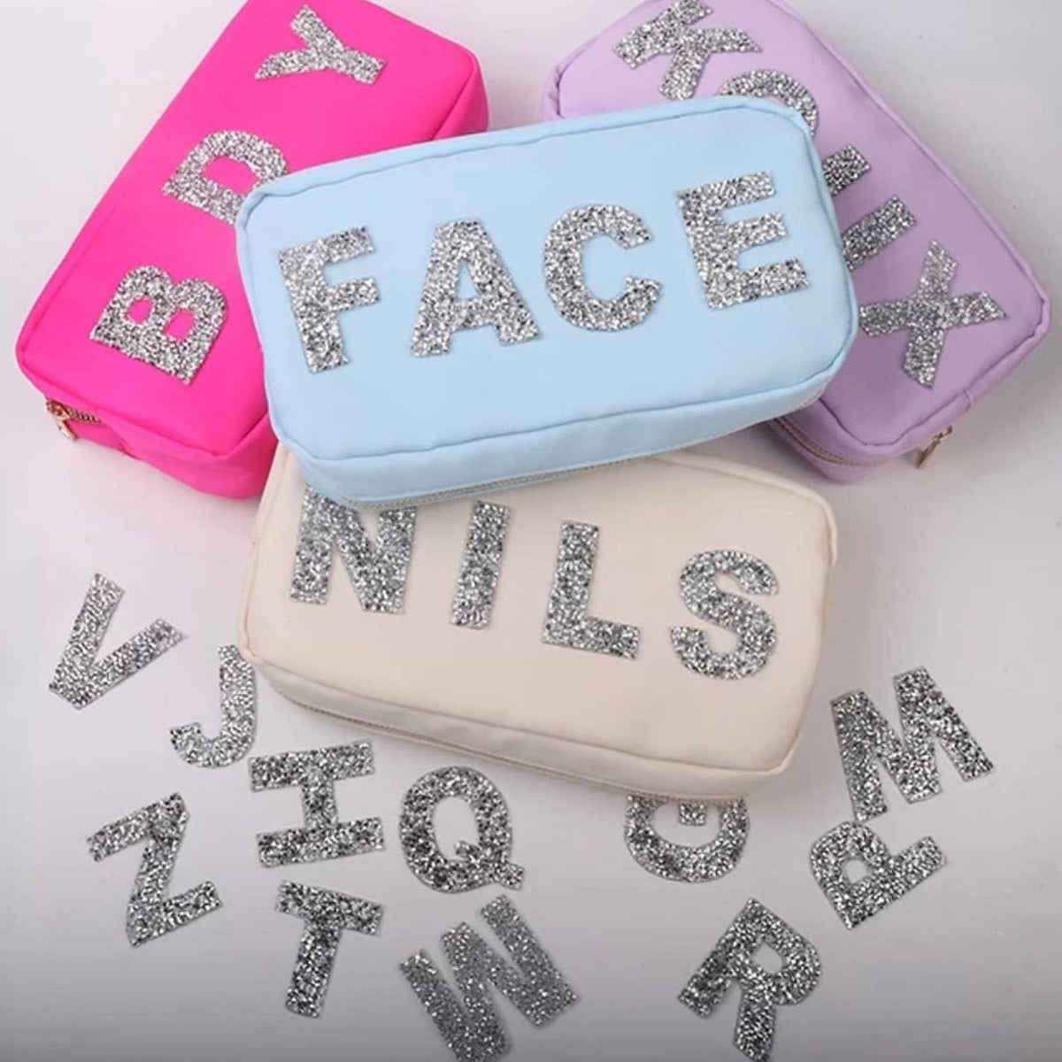 Rhinestone letter patches on pouch accessories, silver letters including BRIDE and FACE