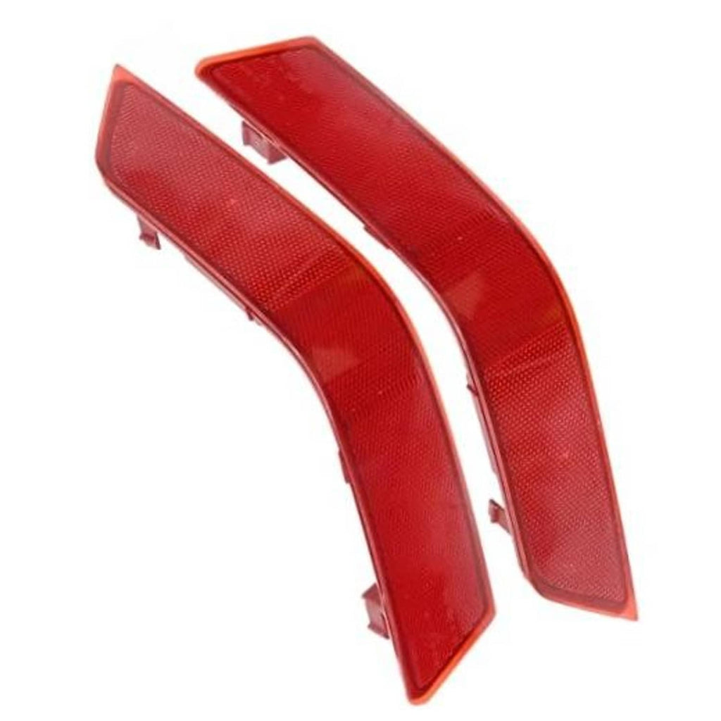 Pair of red rear bumper reflector inserts with mounting tabs, left and right sides