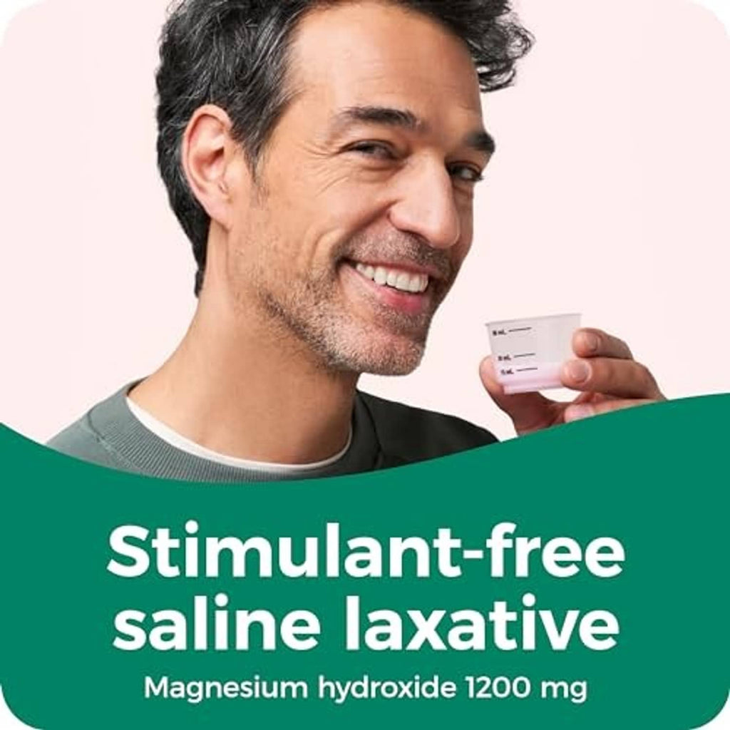 Dulcolax Liquid saline laxative container with man holding a small dosing cup