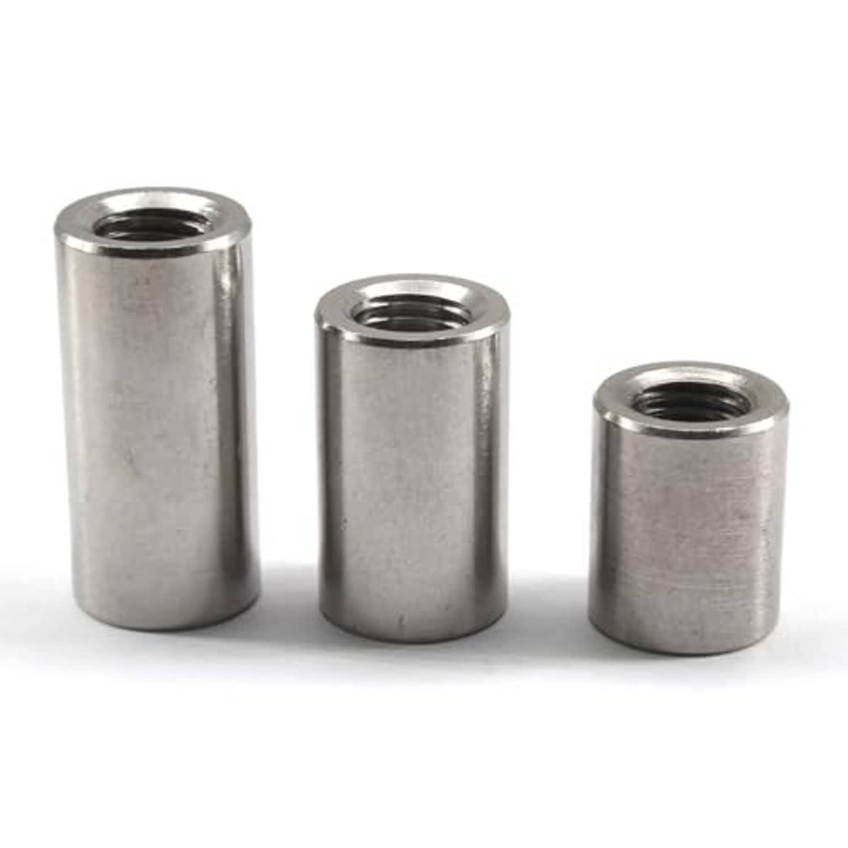 Assorted stainless steel long sleeve nuts, round cylinders with internal threading