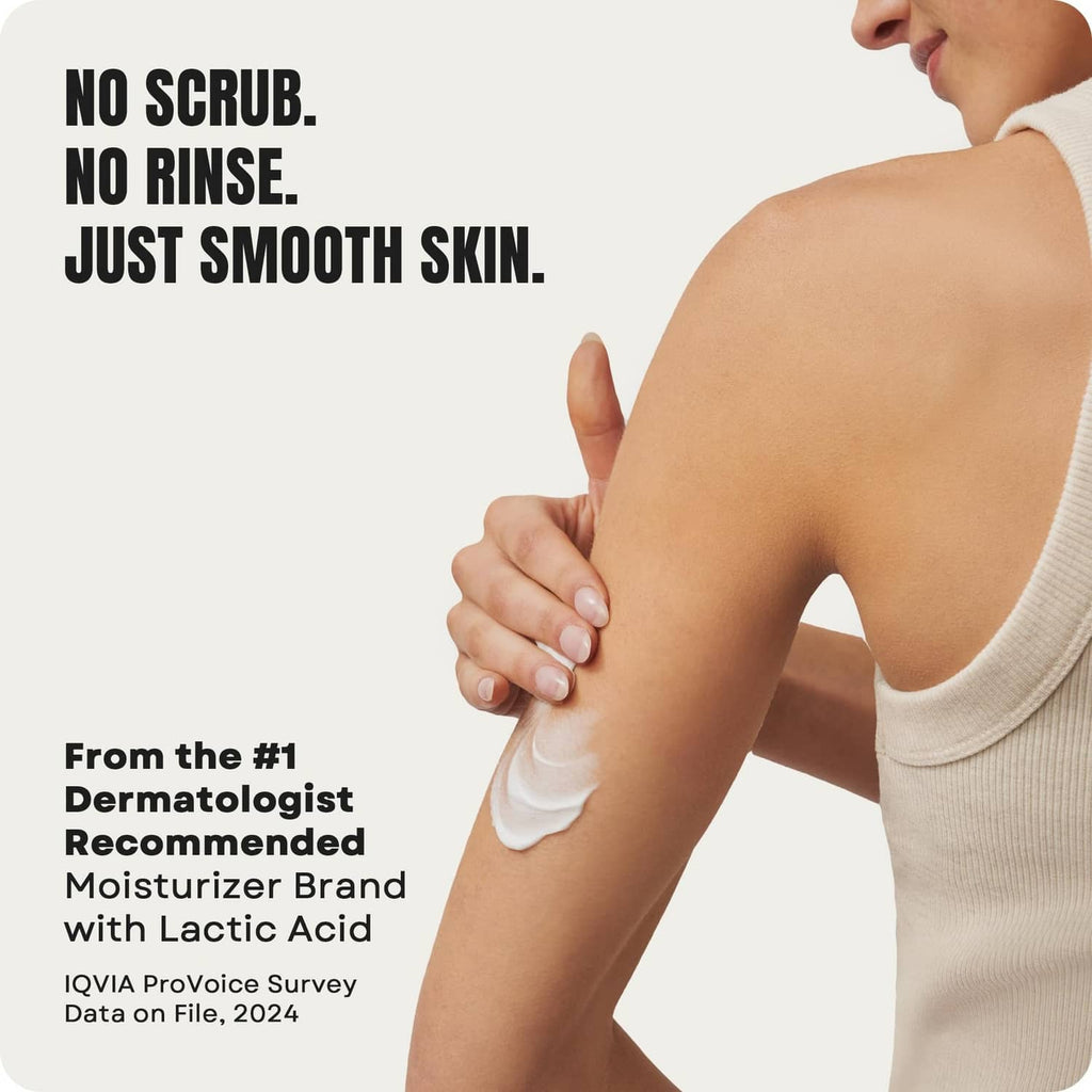 Hand smoothing white lotion on upper arm shoulder area