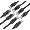 Black Ethernet cables with gold RJ45 connectors, shown in angled close-up.