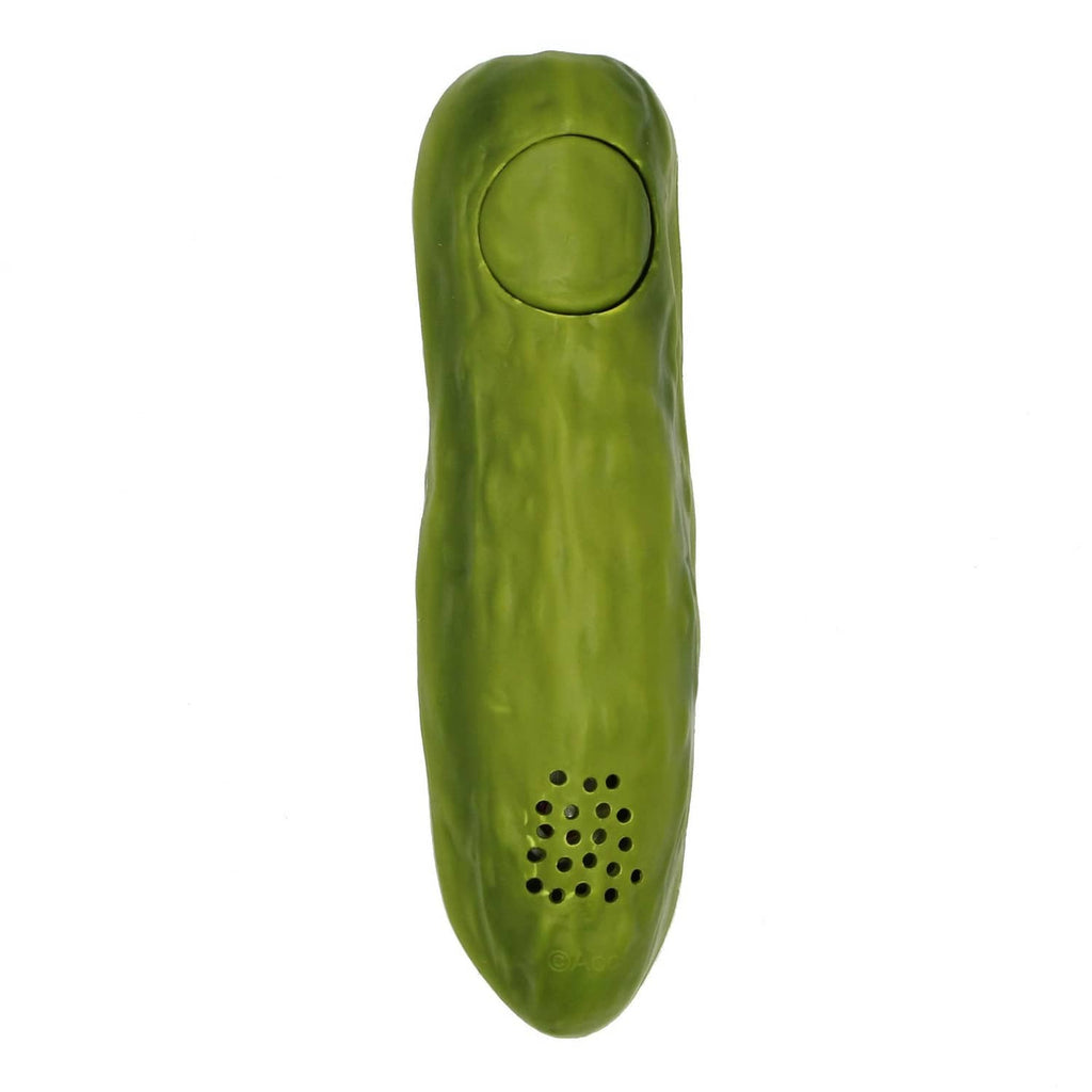 Green electronic yodeling pickle toy with speaker holes on the bottom