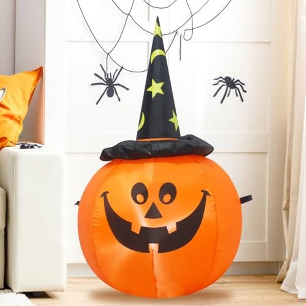 Inflatable orange pumpkin with jack-o'-lantern face and black witch hat, front view