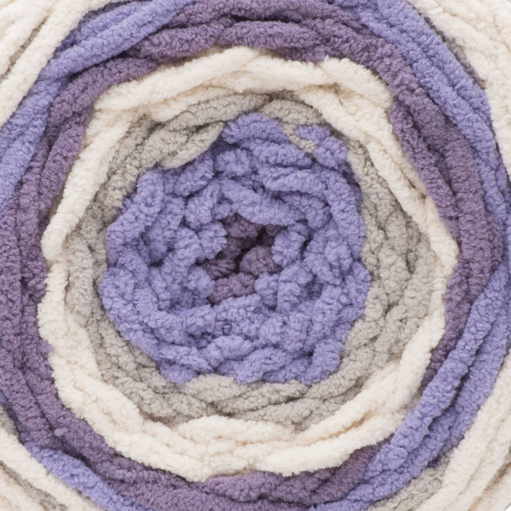 Close-up of braided yarn spiral in lavender and off-white