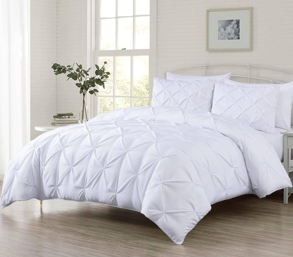 White king comforter set with quilted diamond pinch pleat texture and two pillow shams
