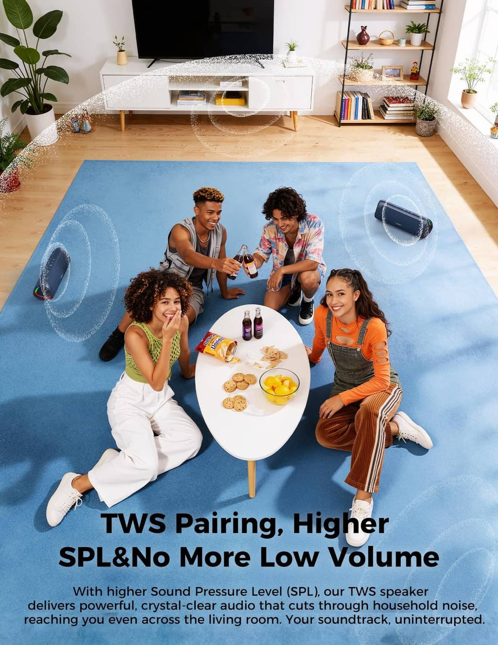 Navy Bluetooth speaker on a rug with colorful LED ring glow in a room setting