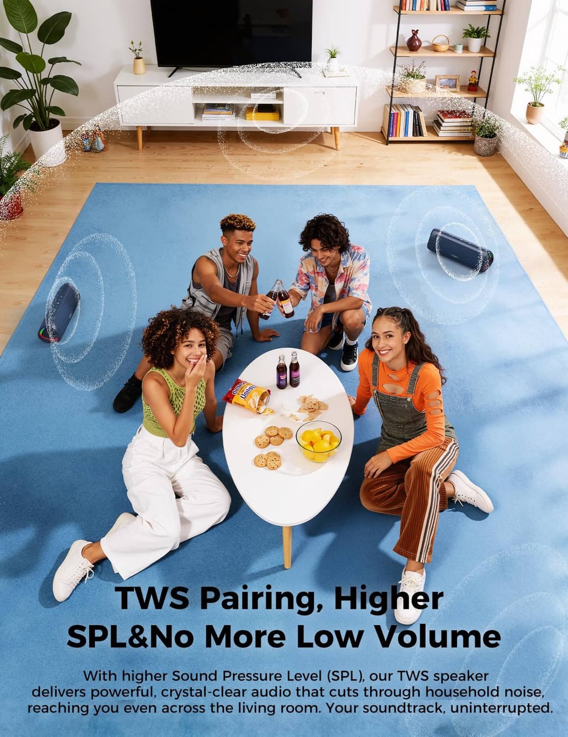 Navy Bluetooth speaker on a rug with colorful LED ring glow in a room setting