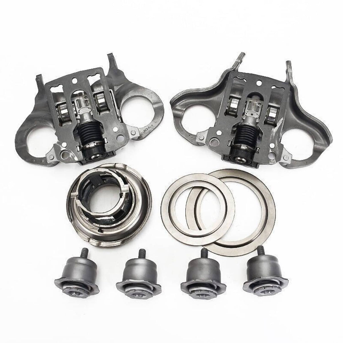 Dual clutch actuator kit: two actuator housings with springs, bushings, and bearings