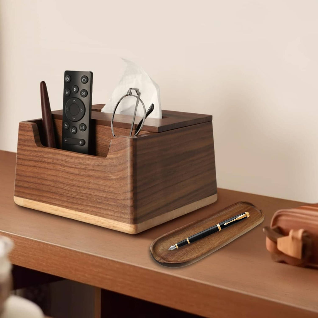 Wood pen tray organizer holding pens, with remote and glasses on desk