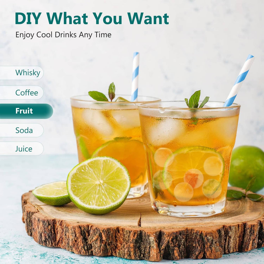 Ice cubes in two glasses with lemon and lime slices on wooden slab