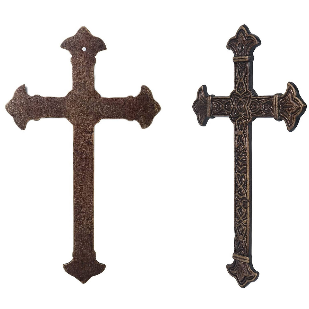 Set of two antique metal crosses with dark engraved designs and arrow ends