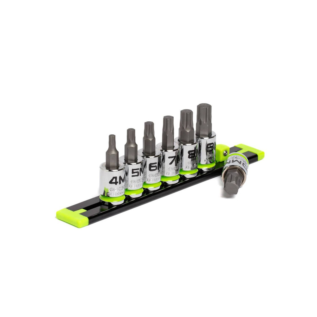 7-piece hex bit socket set on black rail with green-and-black handle, assorted sizes