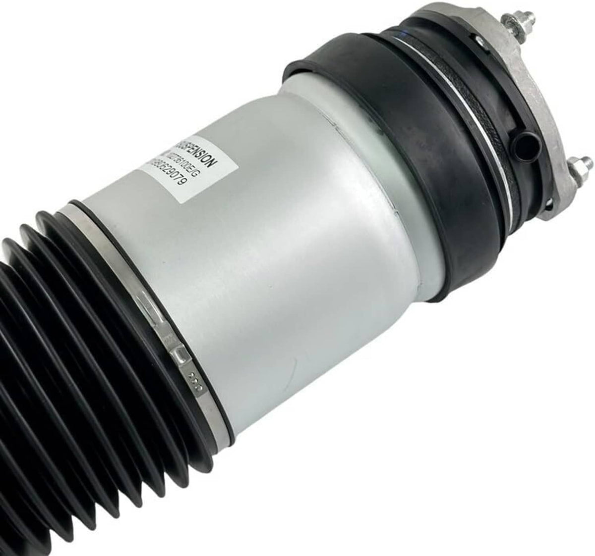 Front air suspension shock strut close-up of silver cylinder and black rubber bellow.