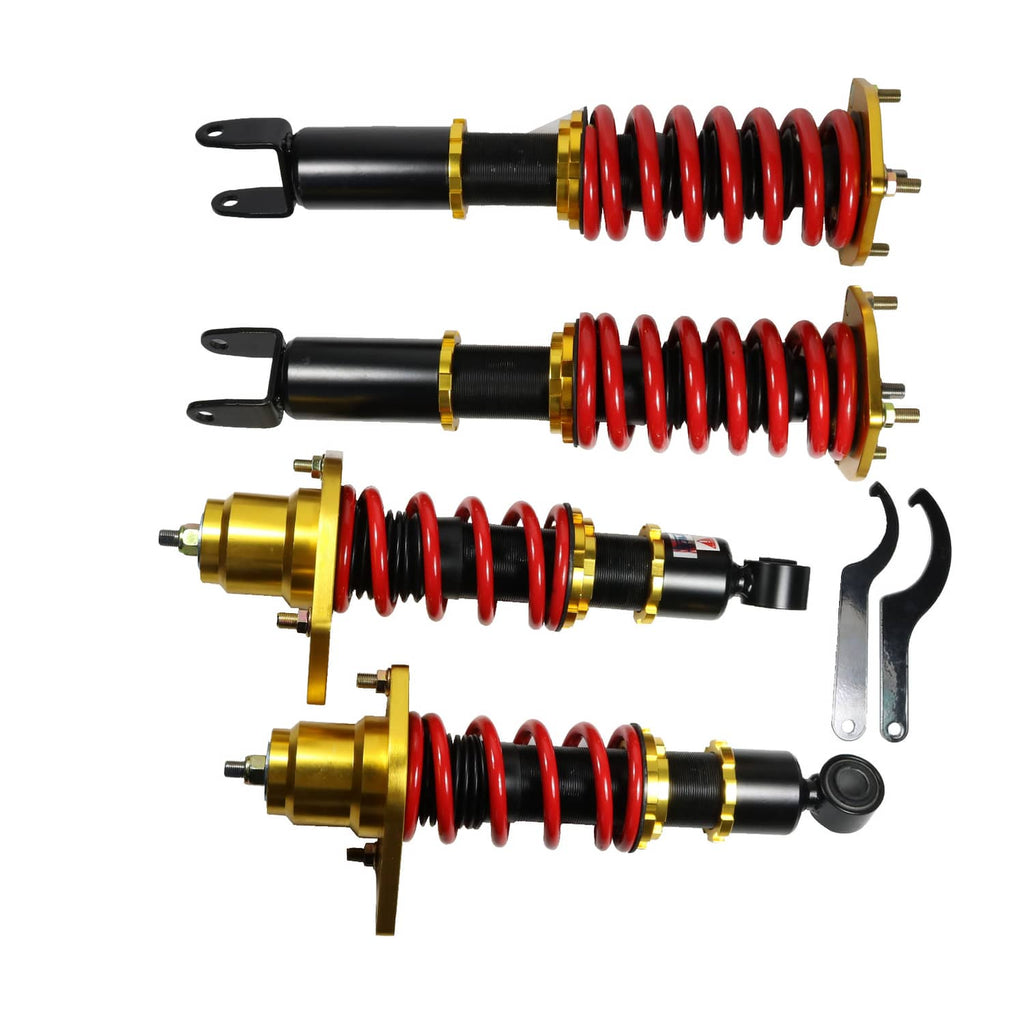 Adjustable height coilover shock struts with red springs and black dampers, gold brackets