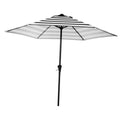 Outdoor patio market umbrella with black-and-white striped canopy and dark central pole