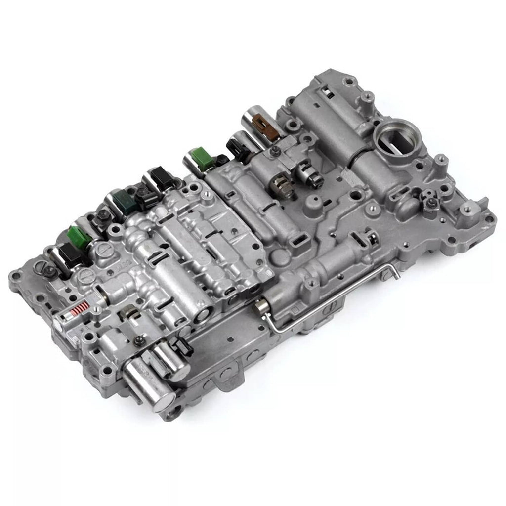 Transmission valve body with solenoids, silver-gray assembly with black and green components