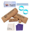 Cork balance training kit with LynxLink board pieces, massage ball, resistance bands, bags