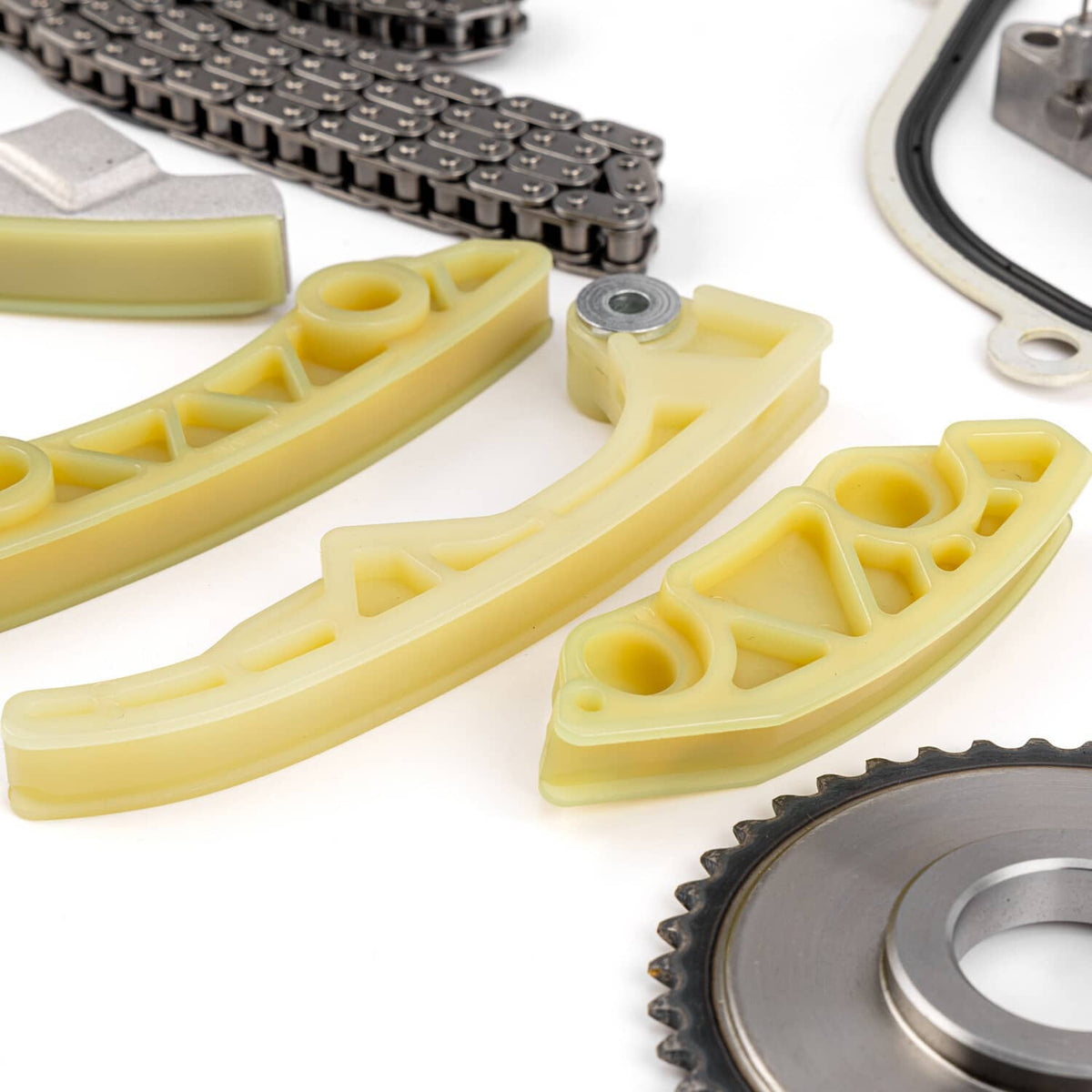 Timing chain kit guide rails with yellow plastic guides and chain sprocket