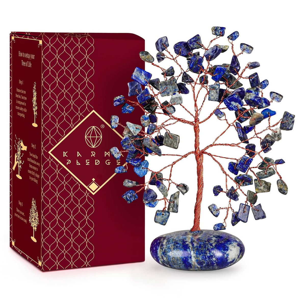 Lapis lazuli crystal tree with blue stone chips and red copper wire on oval base