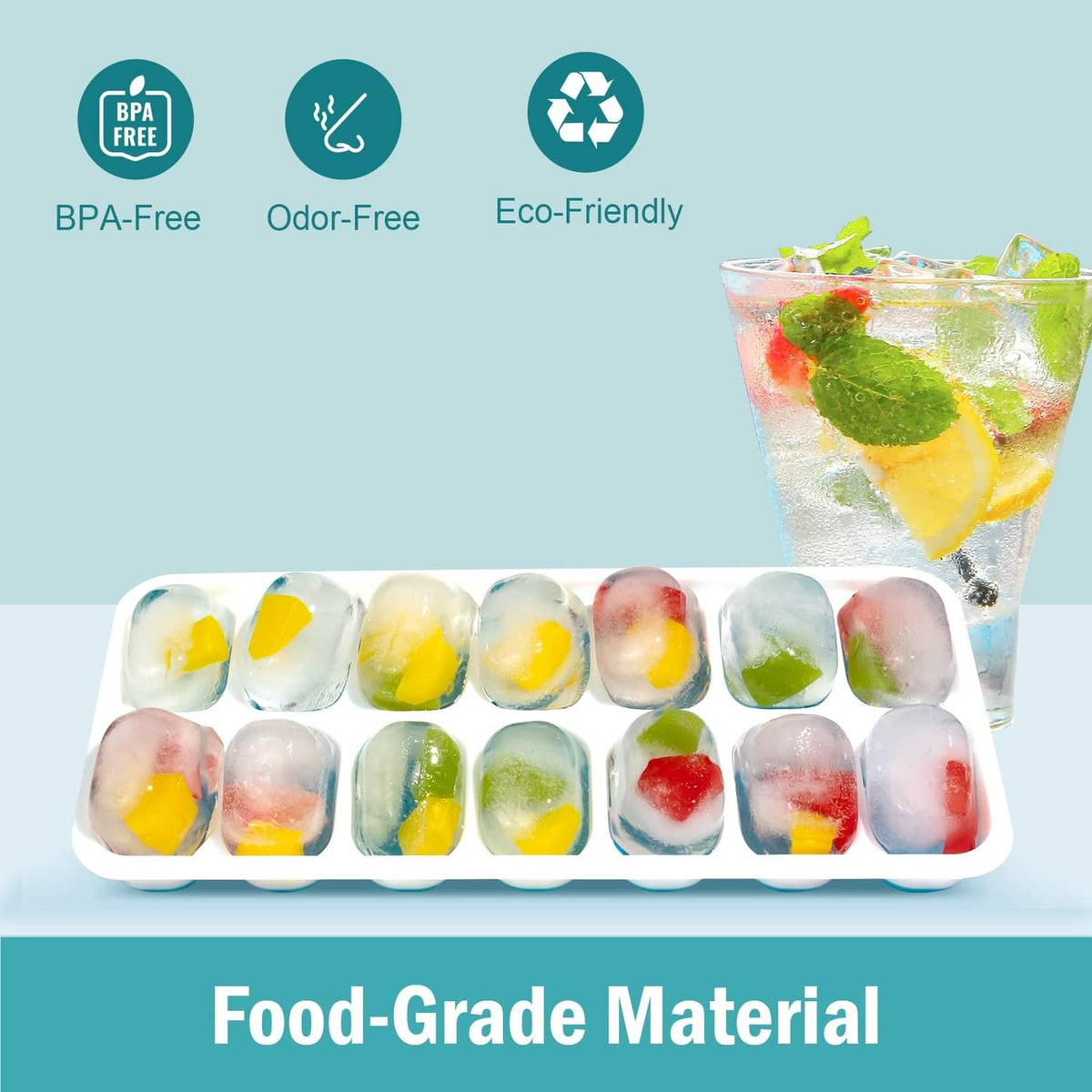 Ice cube tray filled with large cubes and fruit pieces in green and blue molds