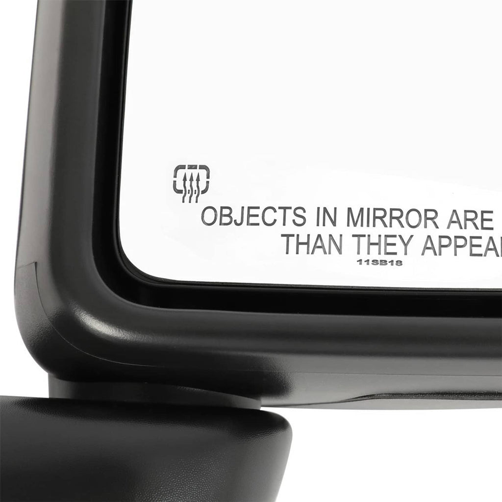 Close-up of heated rearview mirror edge showing warning text and black glossy housing